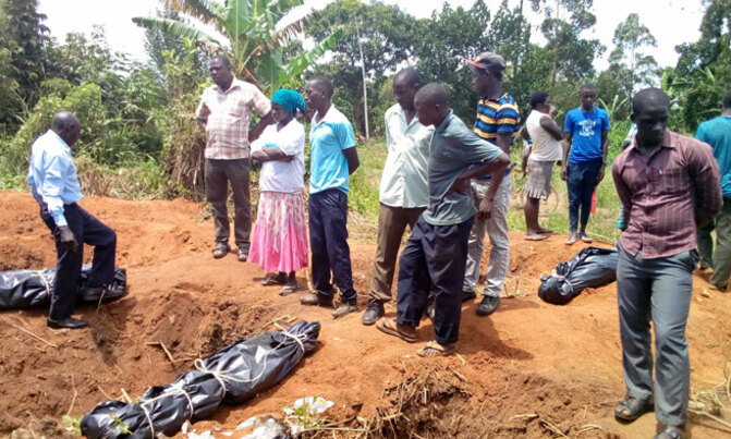 Road displaces graves, seven bodies exhumed Road displaces graves, seven bodies exhumed