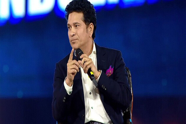 Sachin Tendulkar interacts with Mumbai team players ahead of Ranji Trophy quarter-final clash against Karnataka
