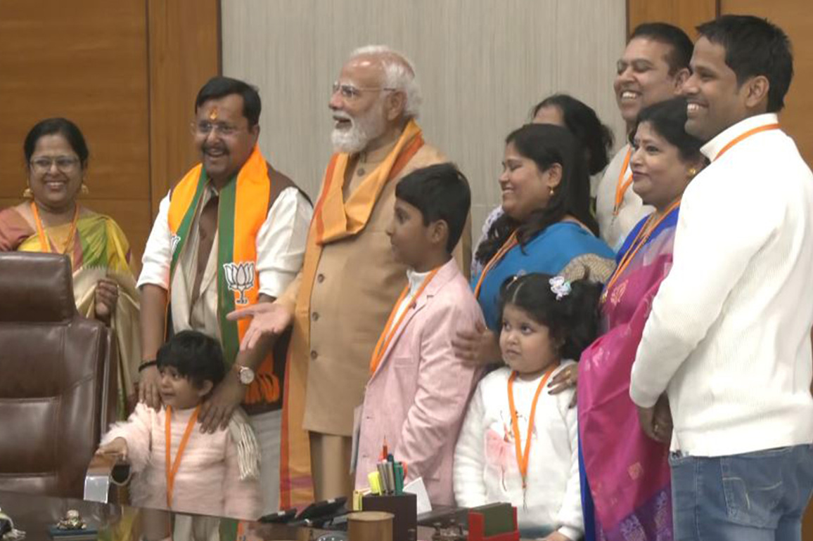PM Modi meets Nitin Nabin's family at BJP headquarters after he took charge as party's national president