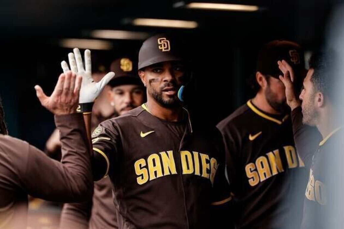 Padres score 5 in ninth to rally past Rockies