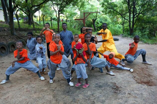 (Hello Africa) With flying kicks into future, Tanzanian girls find strength in Chinese kung fu