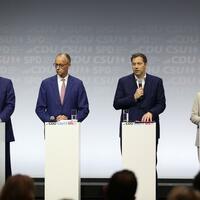 Germany's CDU/CSU, SPD sign coalition deal for new gov't