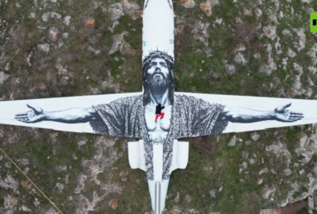 abandoned Soviet jet turned into giant image of Christ