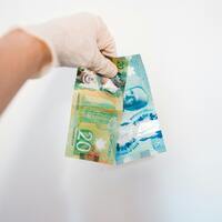 Canadian dollar pressured by oil drop and trade concerns