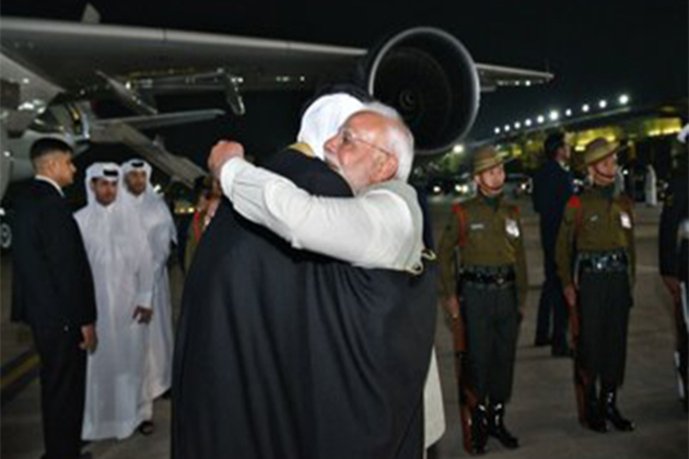 PM Modi greets Amir of Qatar at the airport with a warm hug