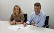 PETRA’s Penny Stewart and Maptek’s Peter Johnson sign the agreement