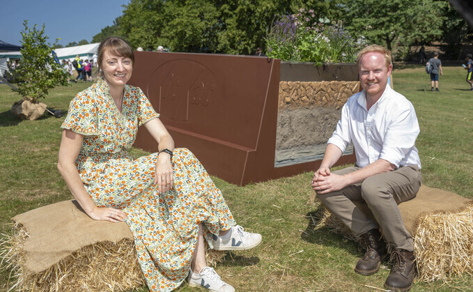 Dr Emma Keller, head of sustainability at Nestlé and Mike Warmington,��regeneration lead at Nestlé, pictured in front of giant KitKat