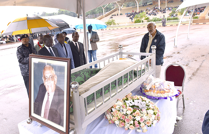 ice resident dward iwanuka ekandi acompanied by the ttorney eneral illiam yaruhanga and businessman atrick itature pay last respects to mirali  armali at ololo eremonial rounds where the body was for public viewing ourtesy hoto