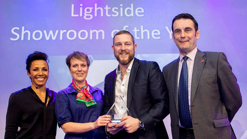 The Merritt & Fryers receiving its Builders' Merchants Award from host Dame Kelly Holmes DBE