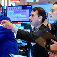 Dow Jones slides 102 points Friday, Nasdaq Composite gains 1