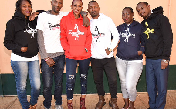 Doreen Kabareebe ow'okusatu okuva ku kkono n'abamu ku bavubuka bakola nabbo mu kibiina kye. Doreen Kabareebe ow'okusatu okuva ku kkono n'abamu ku bavubuka bakola nabbo mu kibiina kye.