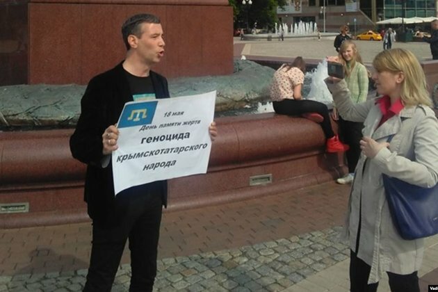 Activist Flees Russia After Assault, Threats