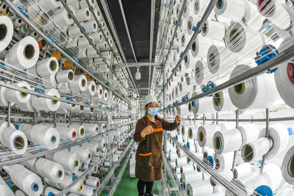 China's textile industry tiding through challenges with reforms