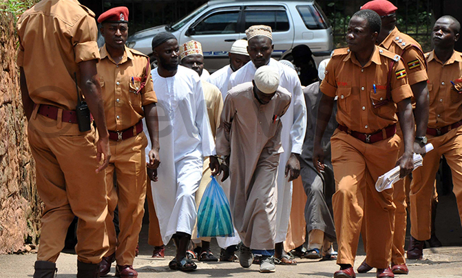 Relatives of re-arrested Kaweesi murder suspects file suit Relatives of re-arrested Kaweesi murder suspects file suit