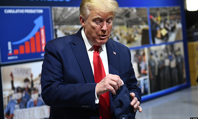Trump says he finally wore a mask -- but not for public viewing Trump says he finally wore a mask -- but not for public viewing