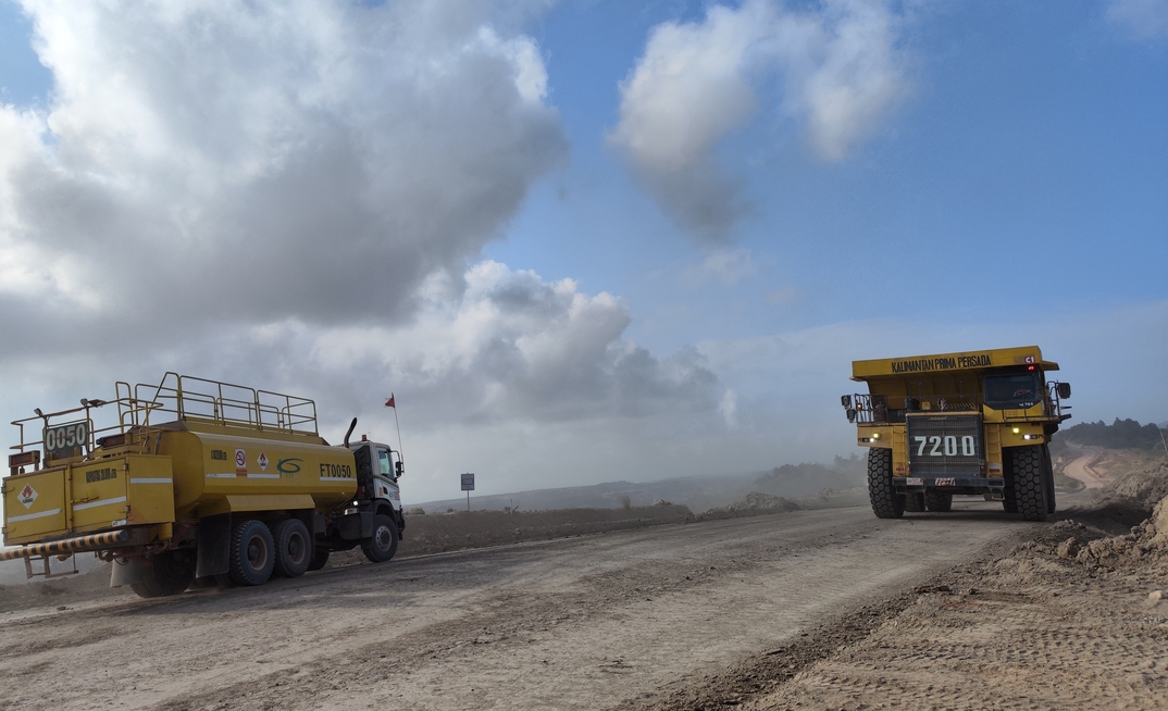 A mining truck and excavator in Tantalum, Indonesia