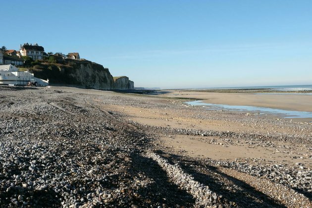 Normandy village takes a gamble on letting in the rising sea