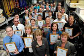 Staff celebrate 940 years of service with Ridgeons
