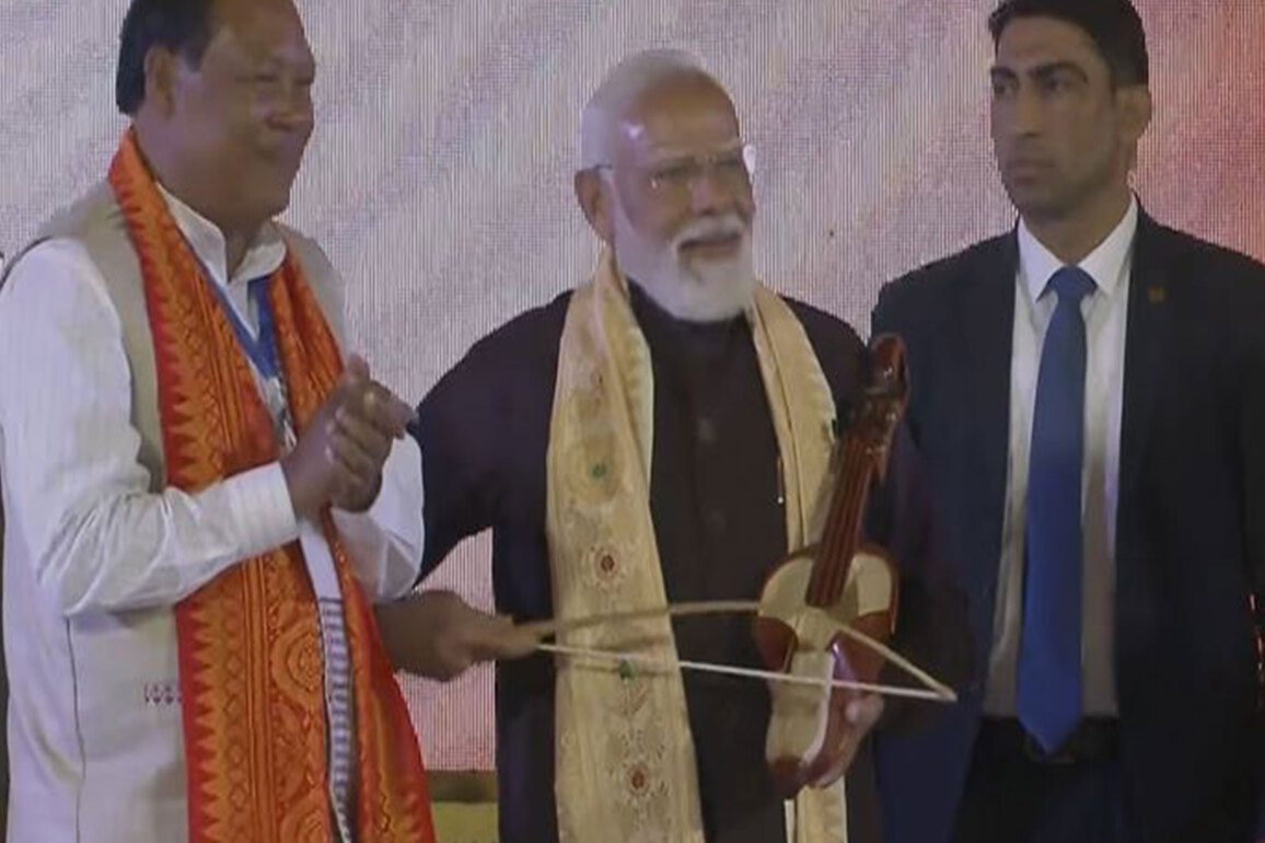 Assam: PM Modi attends 'Bagurumba Dwhou 2026', tries his hand at traditional musical instrument
