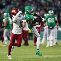 Josh Johnson earns rare victory as Commanders nip Eagles