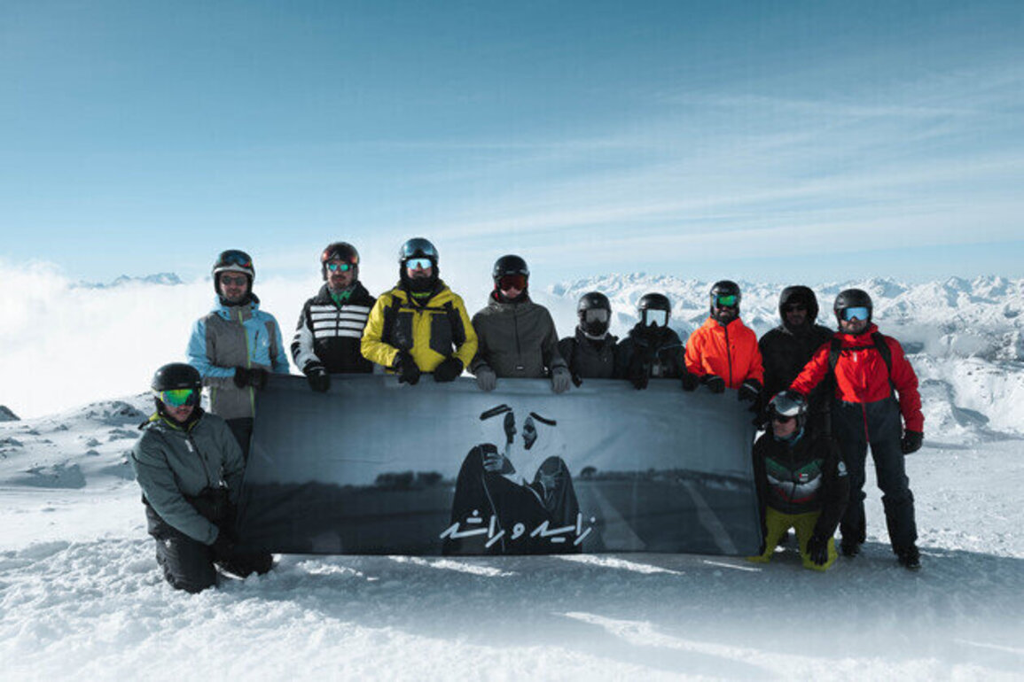 UAE flag, portrait of Zayed and Rashid unfurled atop Alps as part of Eid Al Etihad celebrations