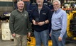  (Left to right) Tom Dame, HMC president, John Jinnings, and Mike Flannery, CEO of Entegra Attachments