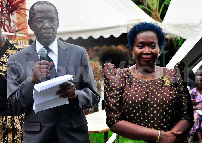   ohan iwanuka together with his wife give their condolence messages to the aggrieved family of the late amson uwanguzi proprietor of ido beach ntebbe during his funeral service at omamboga on ayaza road on 8316    