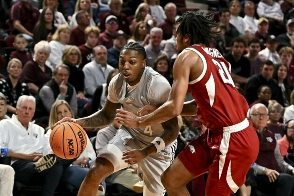 No. 8 Texas A&M pulls away late to seal win over Arkansas