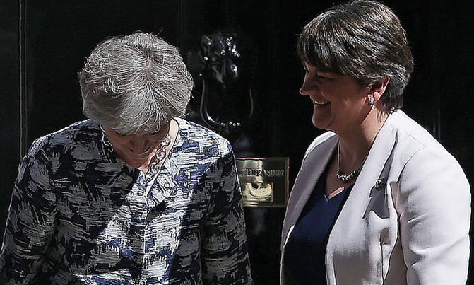 May pays out for deal to govern Britain May pays out for deal to govern Britain