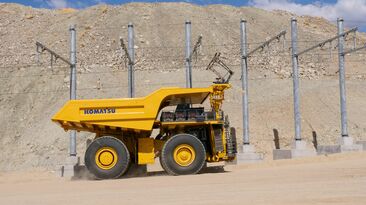 A Komatsu truck on trolley assist at the company's Arizona proving grounds. This is not the truck in the power agnostic trial. Komatsu declined to share a photo of that truck because visible components were still under development.