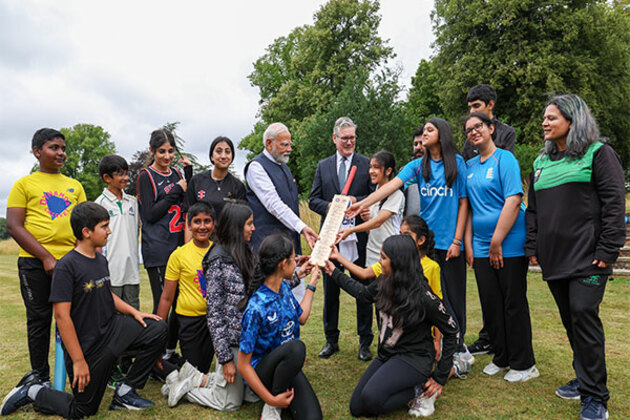 PM Modi interacts with players from Buckinghamshire Street Cricket Hubs, gifts bat signed by World Cup-winning Indian cricket team