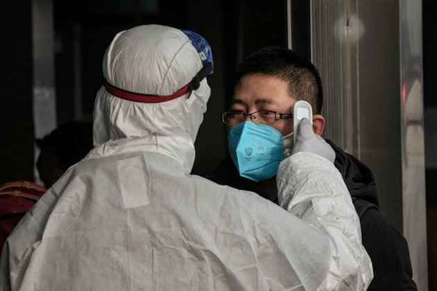 Chinese city eases virus lockdown but life is far from normal