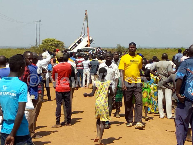  gora residents at the accident scene hoto by harles choda