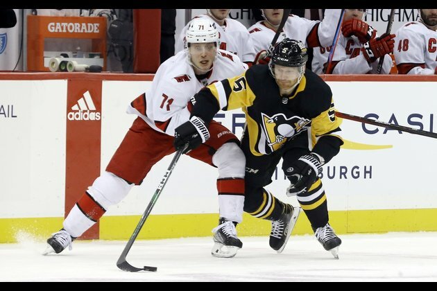 Hurricanes maintain grip on first place by turning back Penguins
