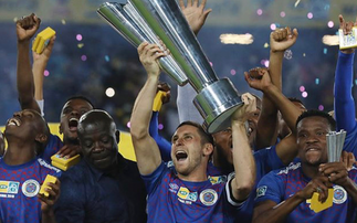Dean Furman celebrates winning the MTN 8 trophy with SuperSport United in South Africa. Image credit: Steve Haag