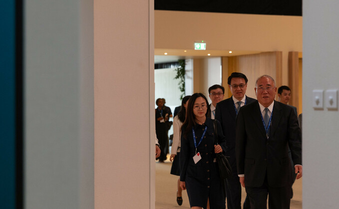 China climate envoy Xie Zhenhua heads to bilateral meeting earlier today | Credit: UNFCCC
