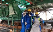 Workers at the Kayelekera crusher