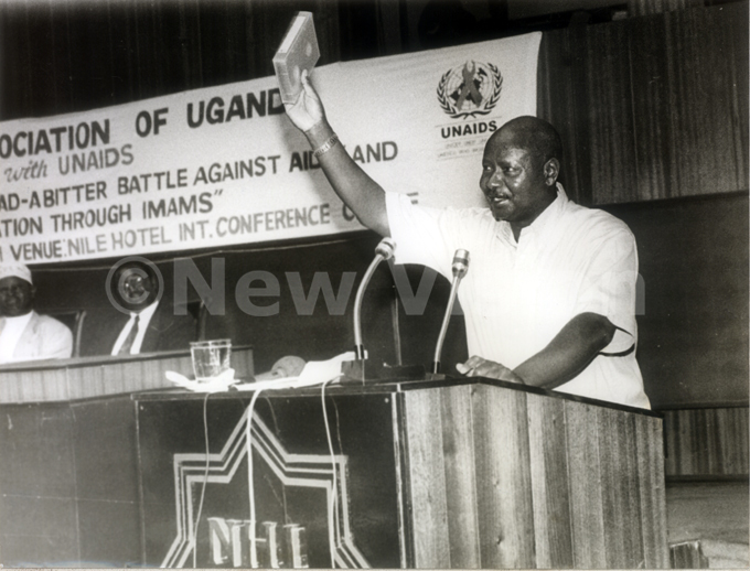 resident useveni holds a tape about  at the onference entre on arch 26 1999