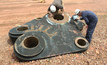 The size of the problem ... NDT technicians inspecting a large scale mining equipment part.