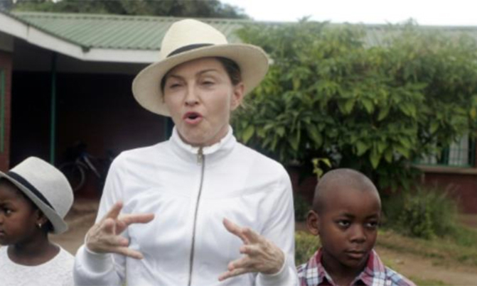Malawi court allows Madonna to adopt twin girls Malawi court allows Madonna to adopt twin girls