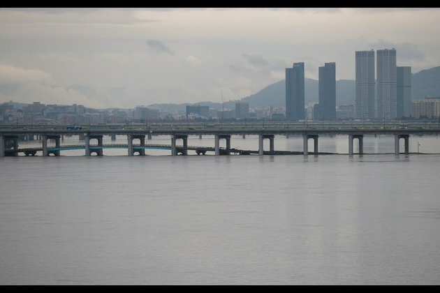 Asia Album: Heavy rain batters South Korea, many areas flooded
