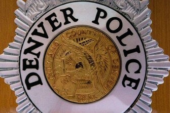 Denver police officer arrested on domestic violence warrant