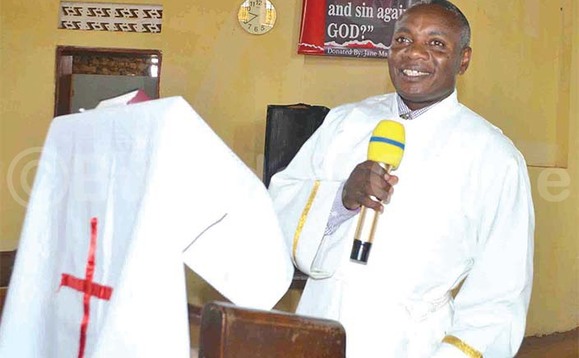 Ordinard Augustine Kayemba mu kusaba. Ordinard Augustine Kayemba mu kusaba.