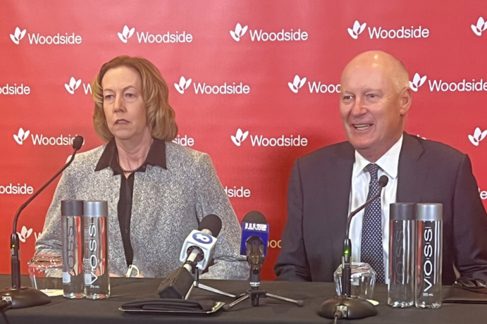 Woodside CEO Meg O'Neill and Chair Richard Goyder face media scrutiny at last year's fiery AGM in Perth.