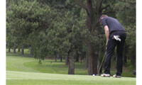 NMBS putts on a successful Golf Day