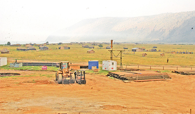   camp being set up by oil exploration workers in the lbertine region