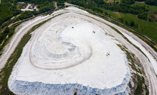 Aerial view of large white mountain of industrial phosphogypsum waste. Photo: BearFotos