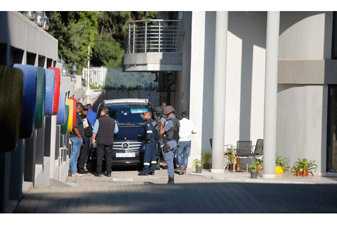 S.Africa police raid house of Zuma's allies in graft probe: official S.Africa police raid house of Zuma's allies in graft probe: official