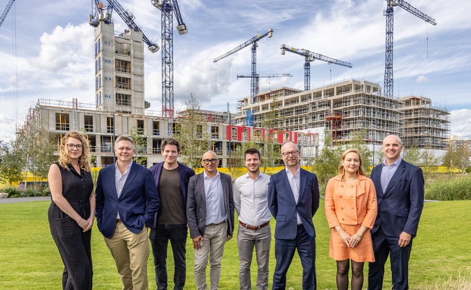 Pictured left to right, with the emerging Brent Cross Town in the background, are Bryony Harrap and Max Cawthorn - PIC; Oli Rifkind, André Gibbs and Simon Beck - Related Argent; Kevin Beirne and Mathilde Guittard - Octopus Real Estate; and John Nettleton, Audley Group