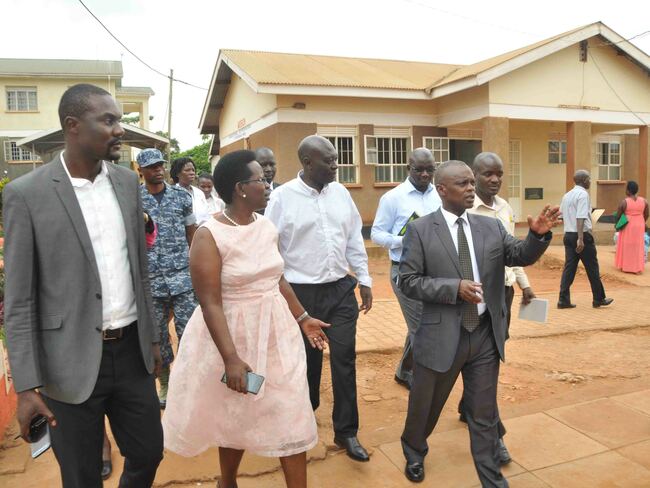  r twine second left with other inistry of ealth officers touring the ukono ealth entre  hoto by enry subuga